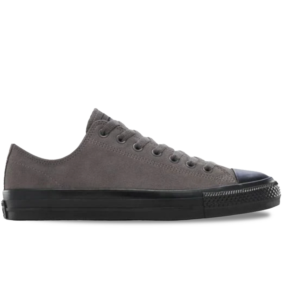 Gray sneaker with black sole on a white background