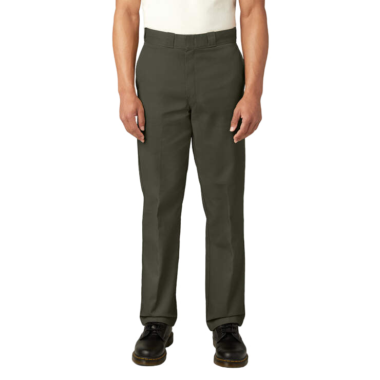 Person wearing olive green pants on a white background