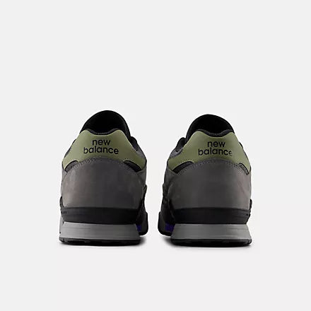 New Balance sneakers shown from the back on a white background