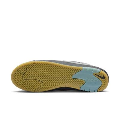 Close-up of a shoe sole with a textured pattern on a white background