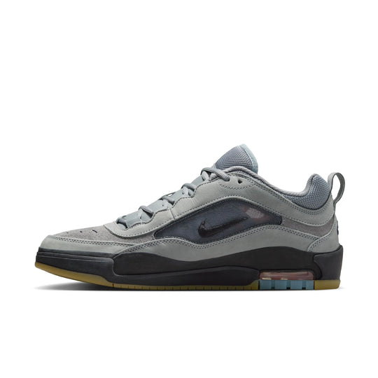 Gray sneaker with black accents on a white background