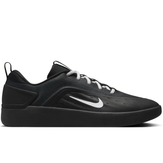 Black athletic shoe with a white logo on a white background