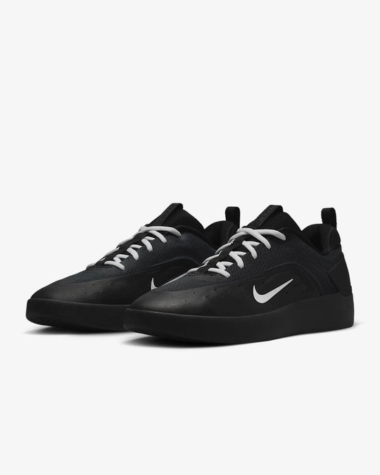 Black sneakers with white Nike logo on a white background