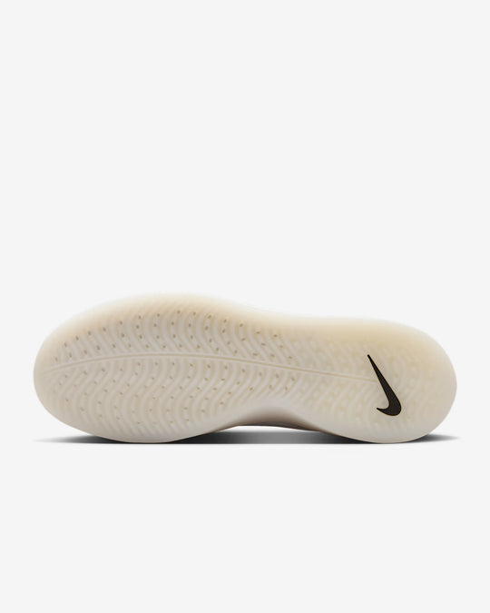 White sneaker sole with Nike logo on a white background