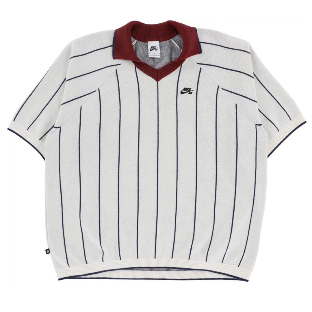 White polo shirt with black pinstripes and red collar on a white background