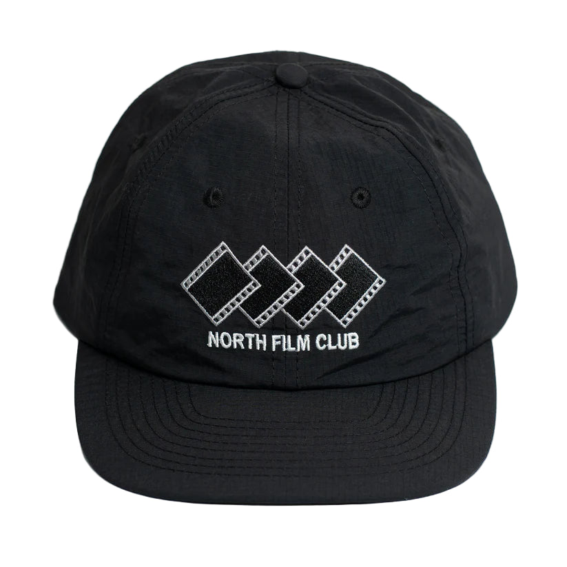 Black cap with 'North Film Club' logo on a white background