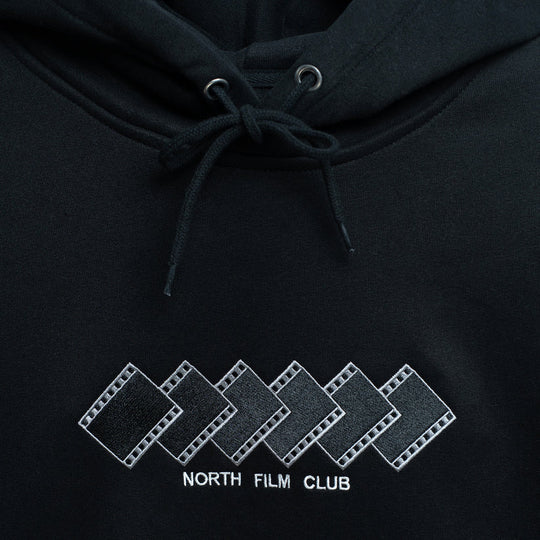 Black hoodie with embroidered 'North Film Club' logo