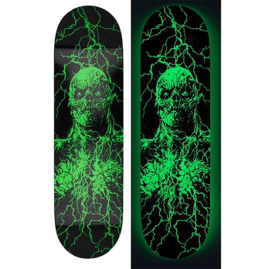 Skateboard deck with green electric shock design on a black background