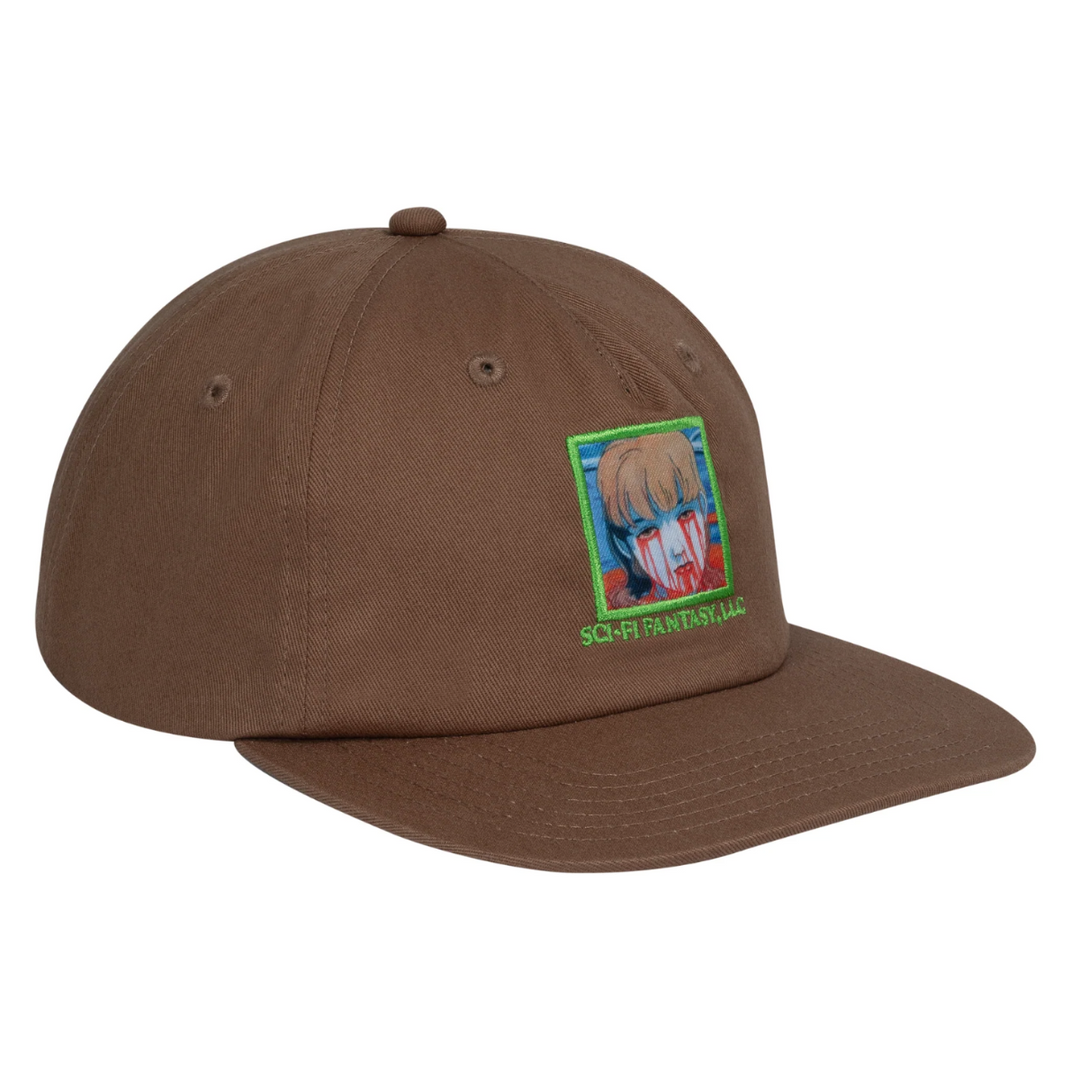 brown hat with green logo