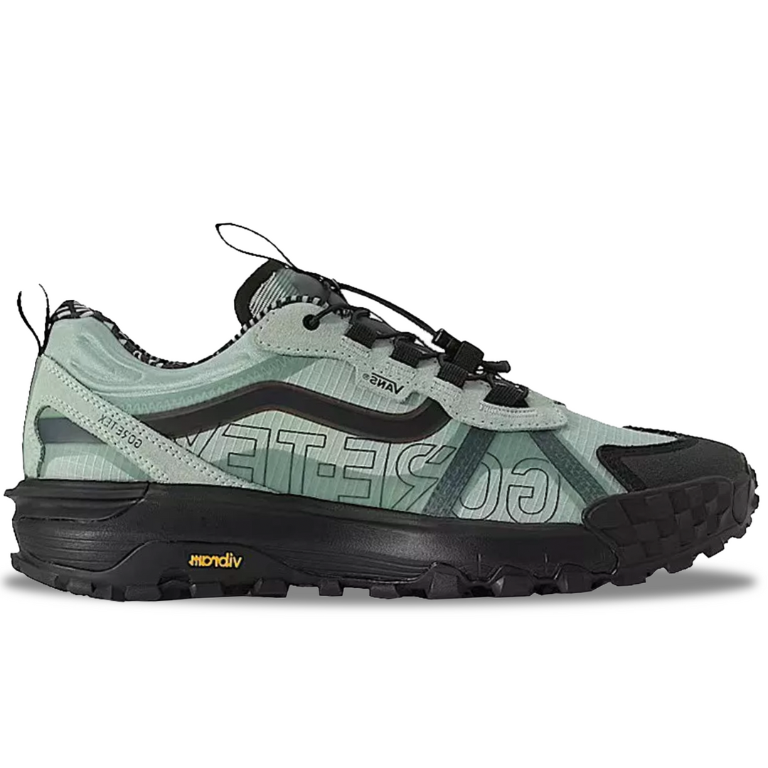 Green and black athletic shoe on a white background