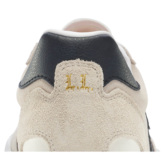 gold embroidered louie lopez logo