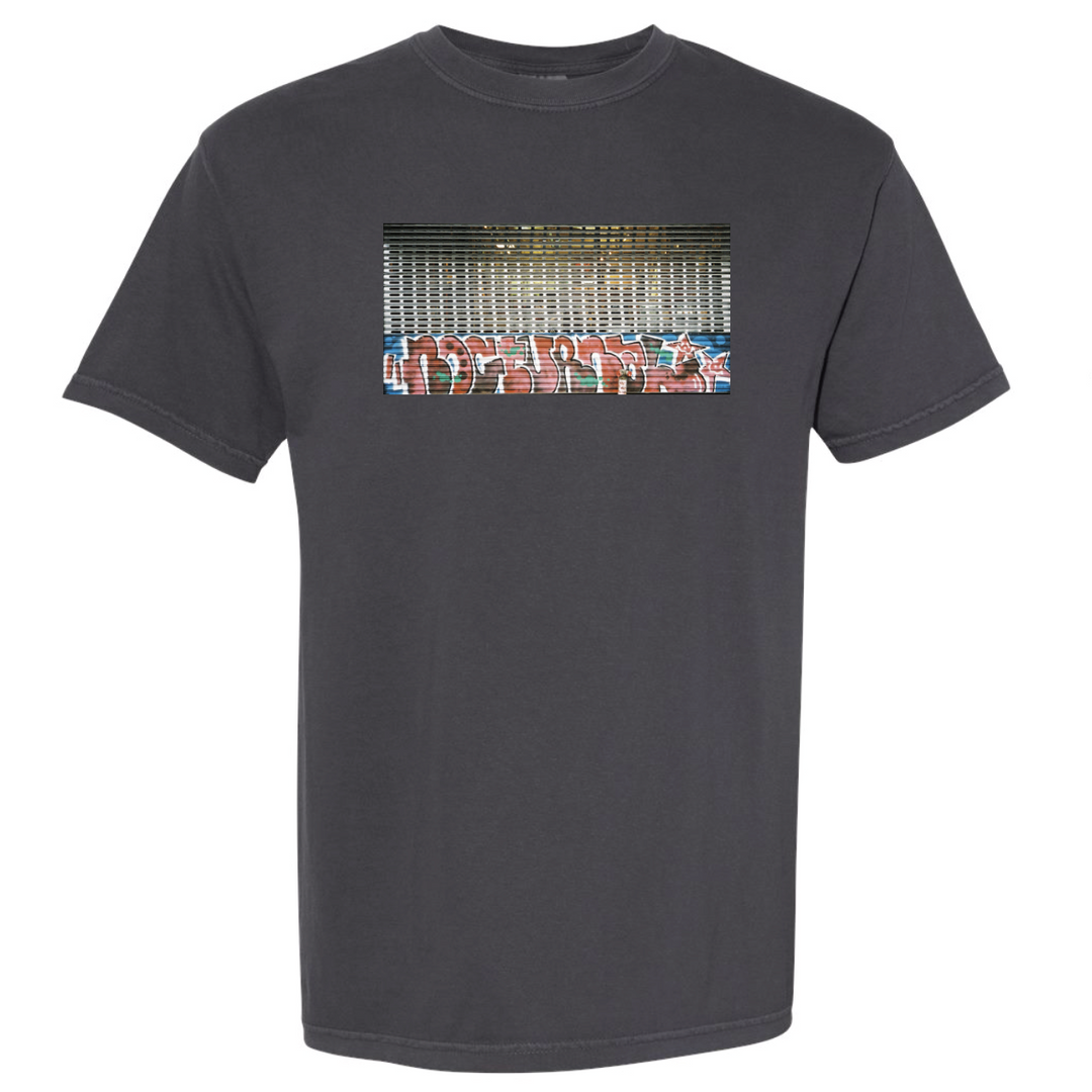 Black t-shirt with a colorful graphic design on a white background