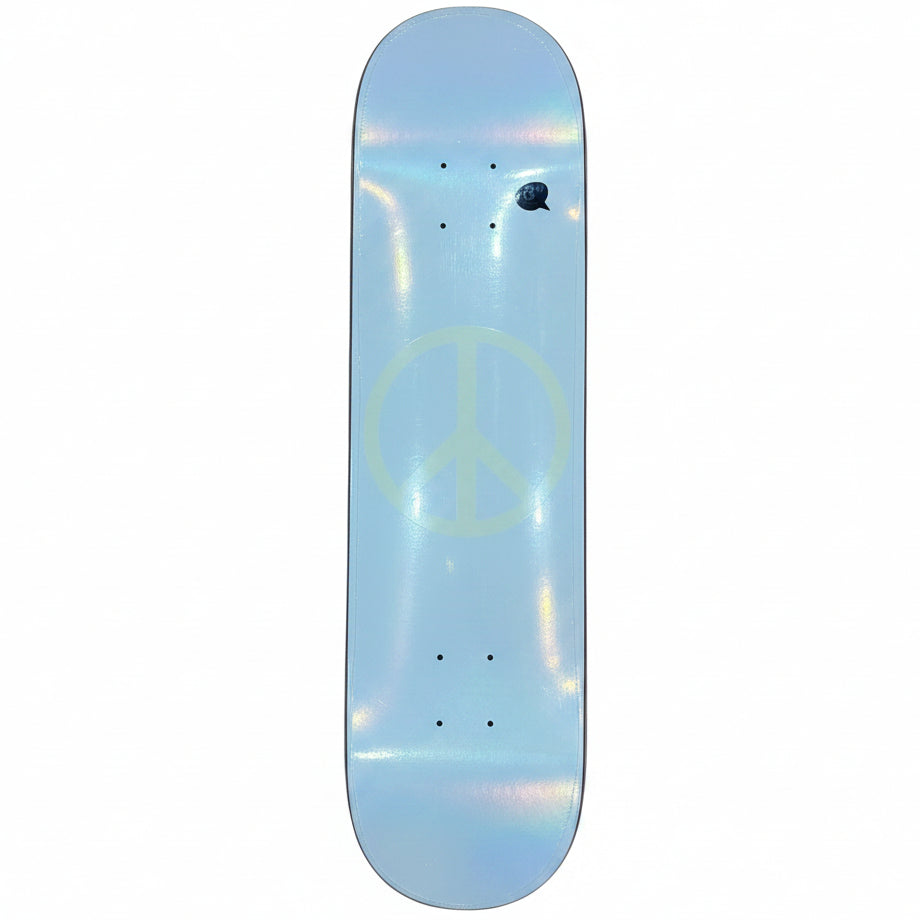 A white skateboard deck with a yellow peace sign graphic, photographed from above on a light-colored wooden floor.