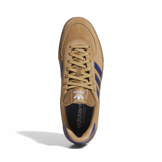 A single Adidas Samba sneaker in tan suede with blue stripes, shown from a top-down view on a white background.