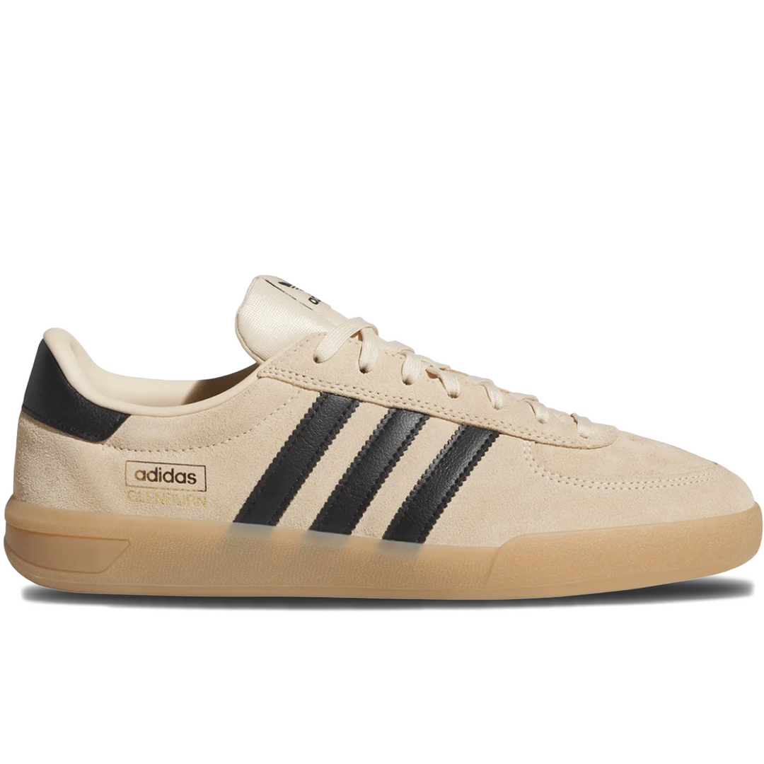 Beige Adidas sneaker with black stripes 