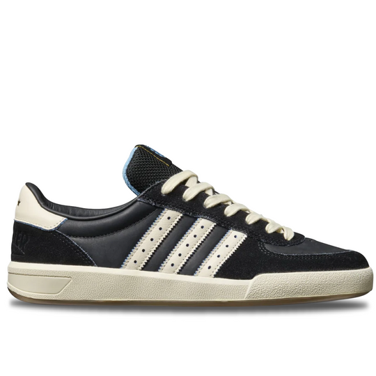 Black and white sneaker with three stripes on a white background