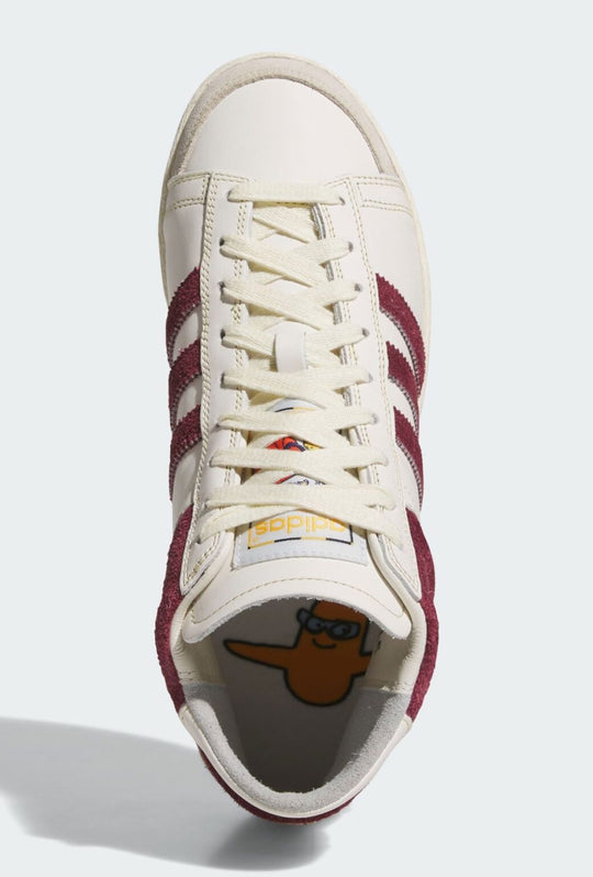 top of White sneaker with red stripes on a white background