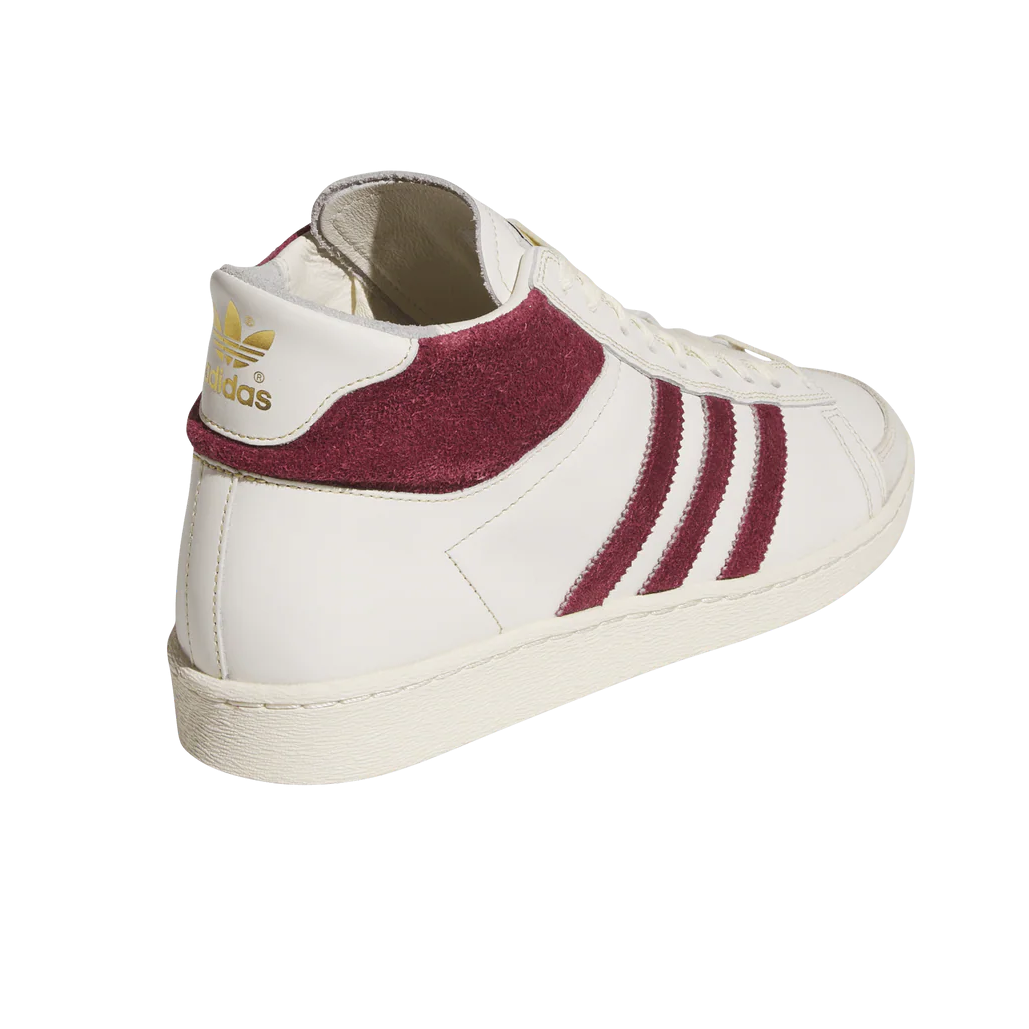 White Adidas sneaker with maroon accents