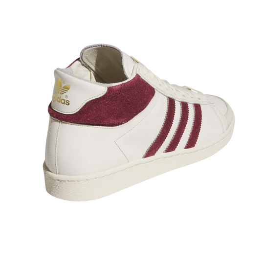 White Adidas sneaker with maroon accents