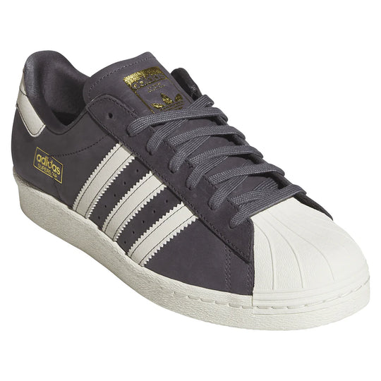 gold adidas superstar logo