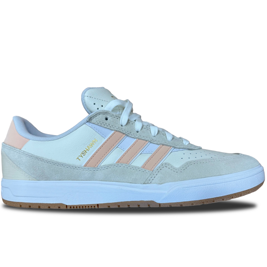 Light blue sneaker with pink accents on a white background