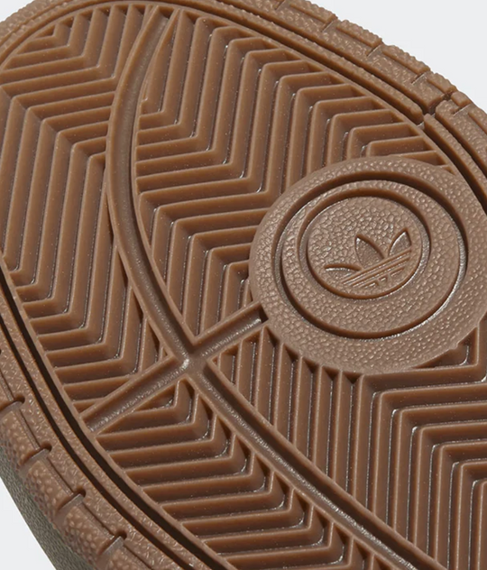 Close-up of a brown shoe sole with Adidas logo