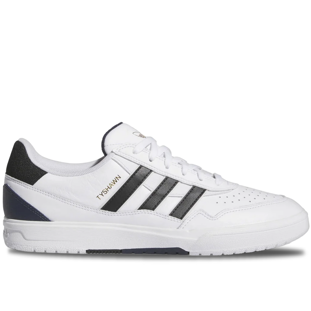 White sneaker with black accents on a white background