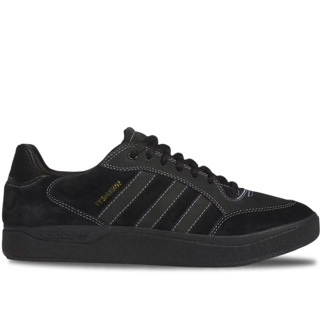 Black sneaker with Adidas logo on a white background