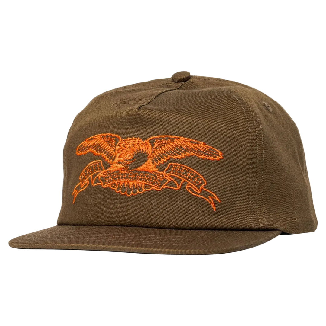 Brown cap with orange anti hero 
eagle emblem on a white background