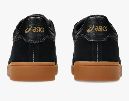 Black Asics sneakers with gold logo 