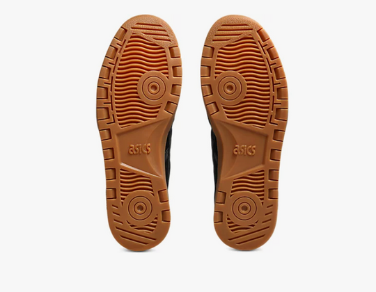 Brown Asics shoe soles