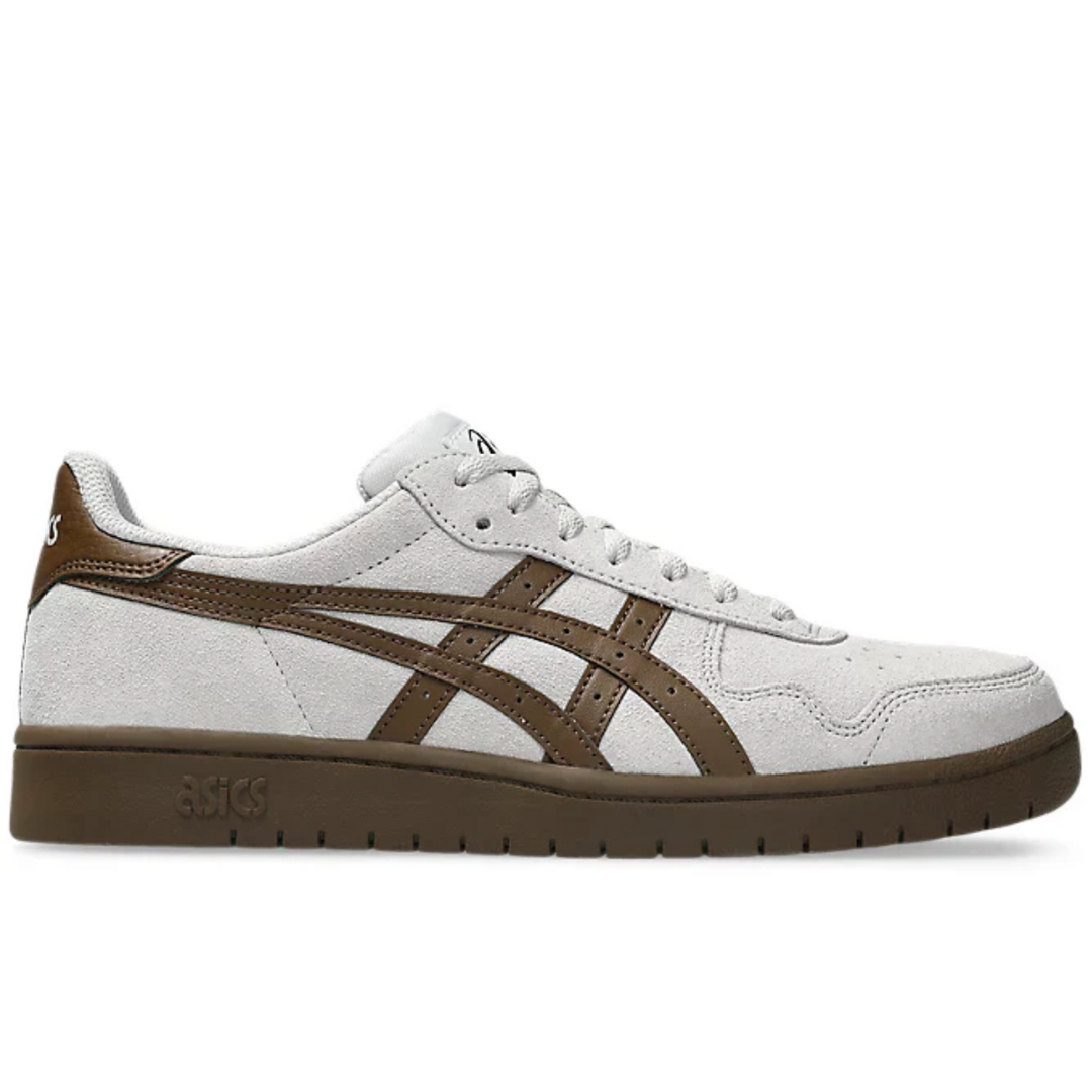 White and brown sneaker with 'Onitsuka' branding on a white background