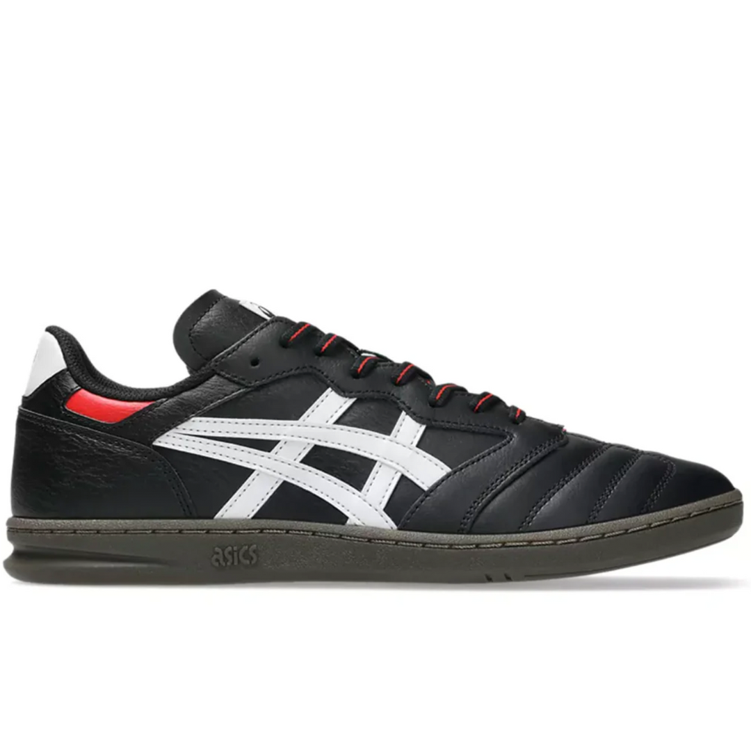 Black sneaker with white and red accents on a white background