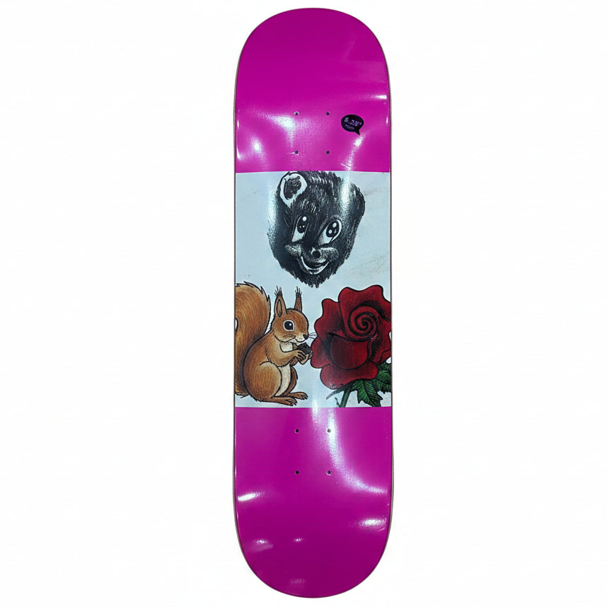 A skateboard deck with a bright pink top and bottom and a white center graphic featuring black ink sketches of a bear face, a rose, and a spiral motif, photographed from above on a wooden floor.