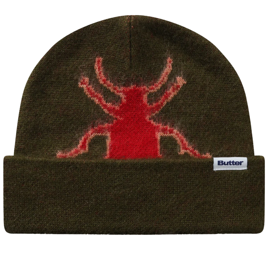 Brown beanie with beetle design and Butter logo on a white background