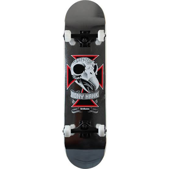 Skateboard with a black and red design featuring a skull and crossbones on a white background.