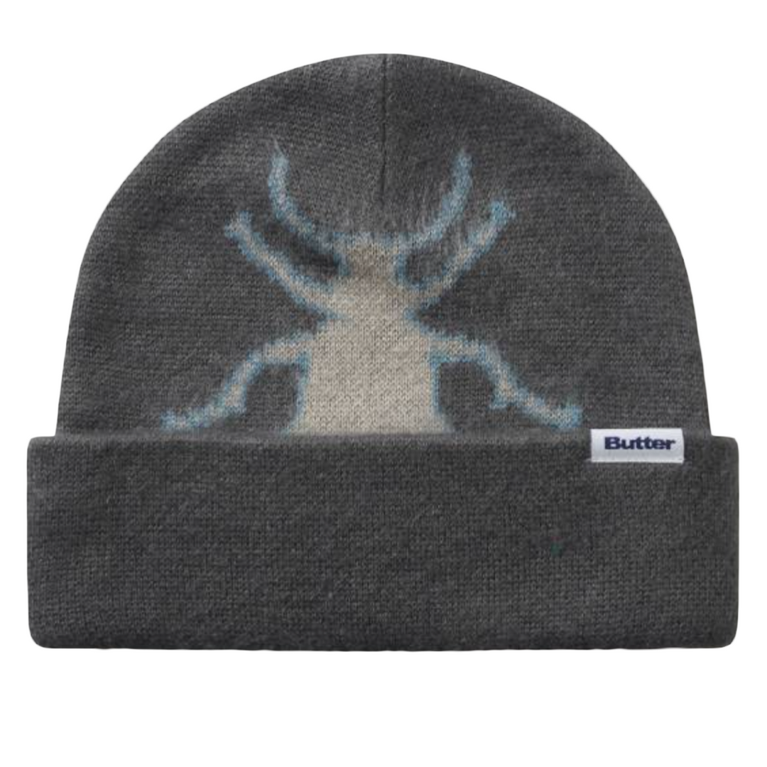 Gray beanie with a beetle design and 'Butter' label on a white background