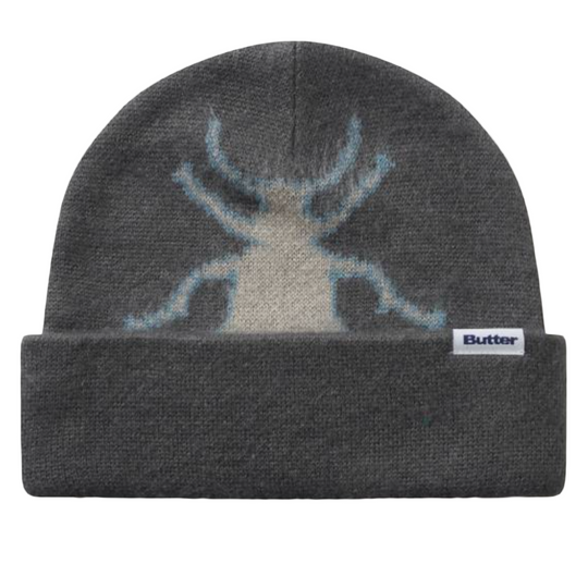 Gray beanie with a beetle design and 'Butter' label on a white background