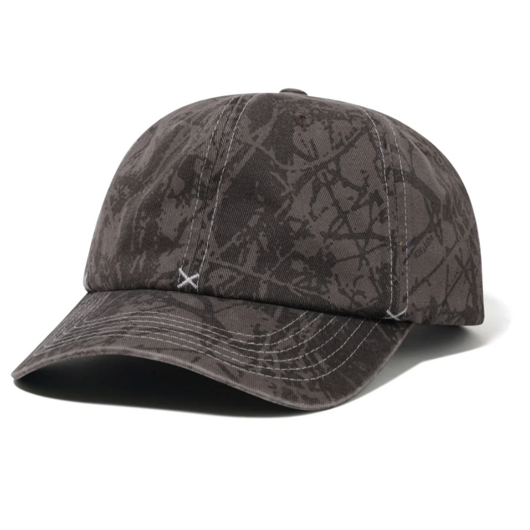 Dark camouflage baseball cap on a white background