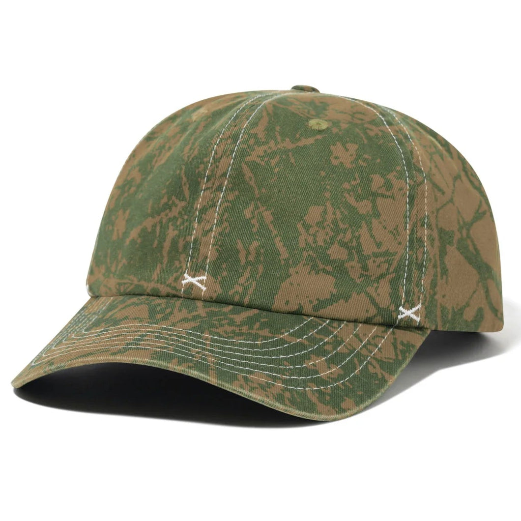 Camouflage-patterned baseball cap on a white background