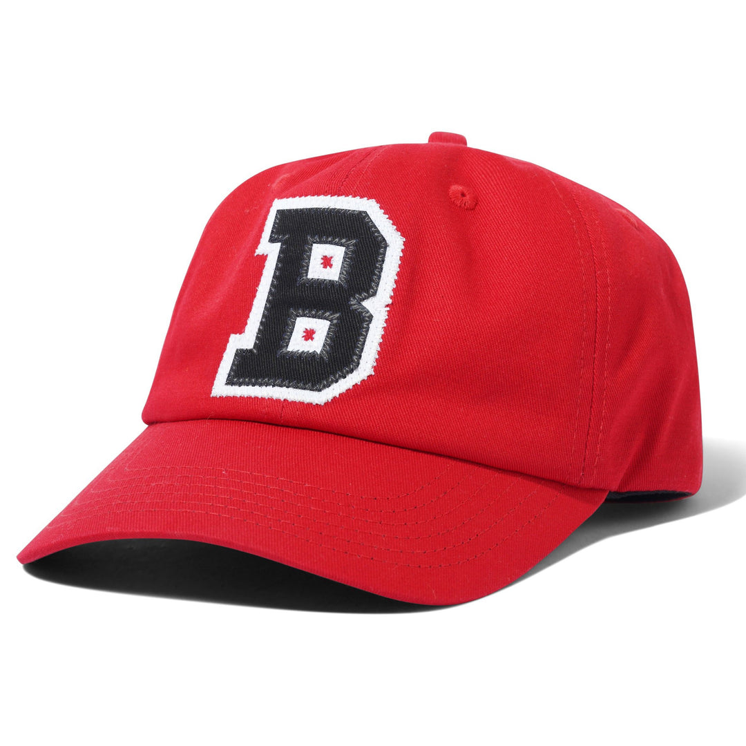 A red baseball cap featuring a large embroidered black letter 'B' with a white border on the front panel, set against a plain white background.