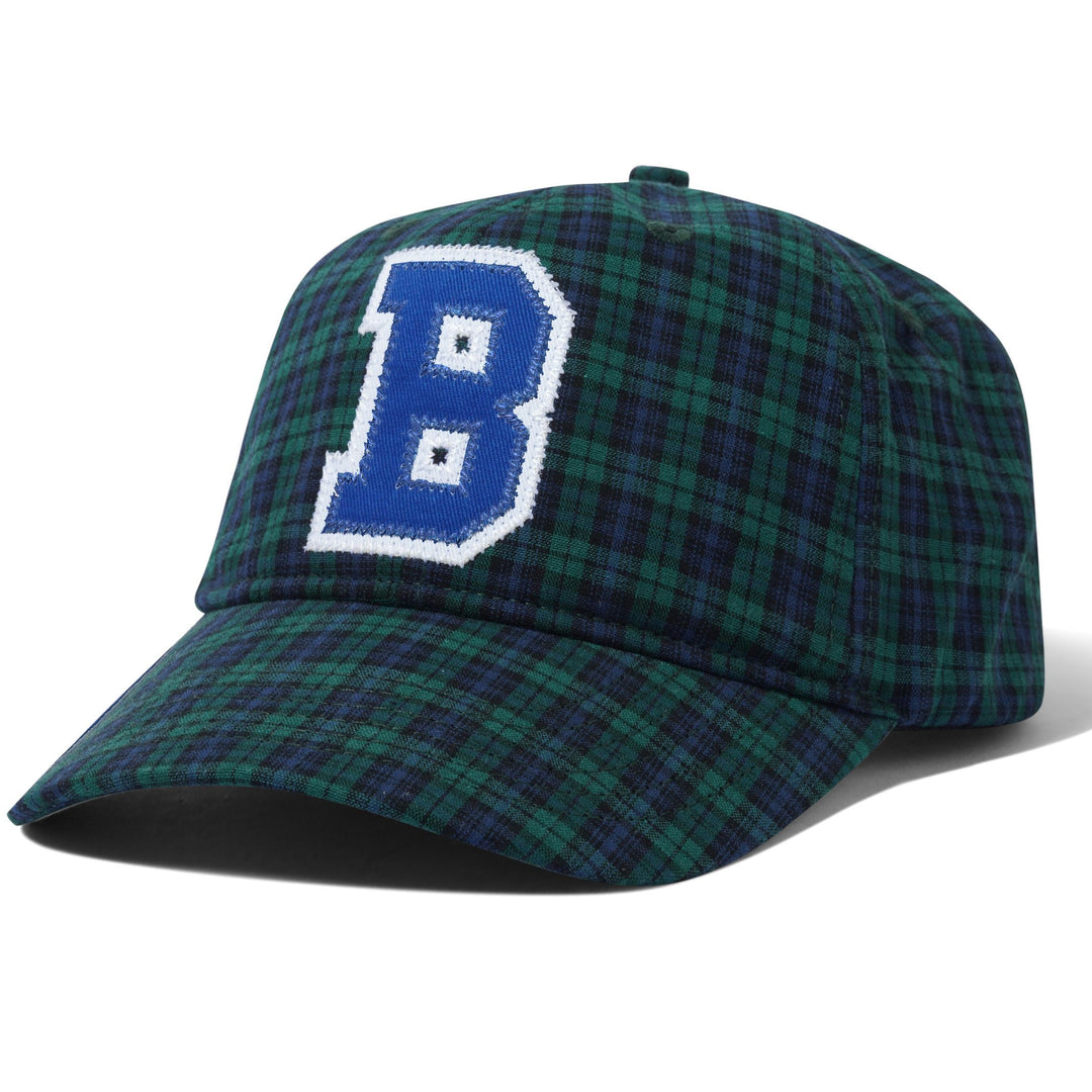 A structured baseball cap featuring a green and navy plaid pattern, with a prominent blue and white embroidered letter 'B' on the front panel.