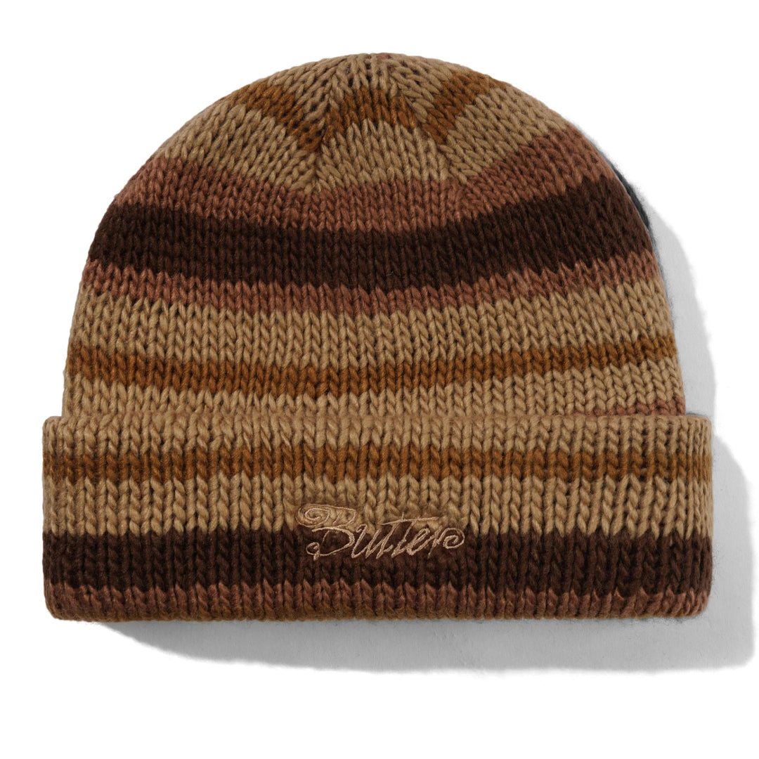 Brown and beige striped beanie with a butter brand logo 