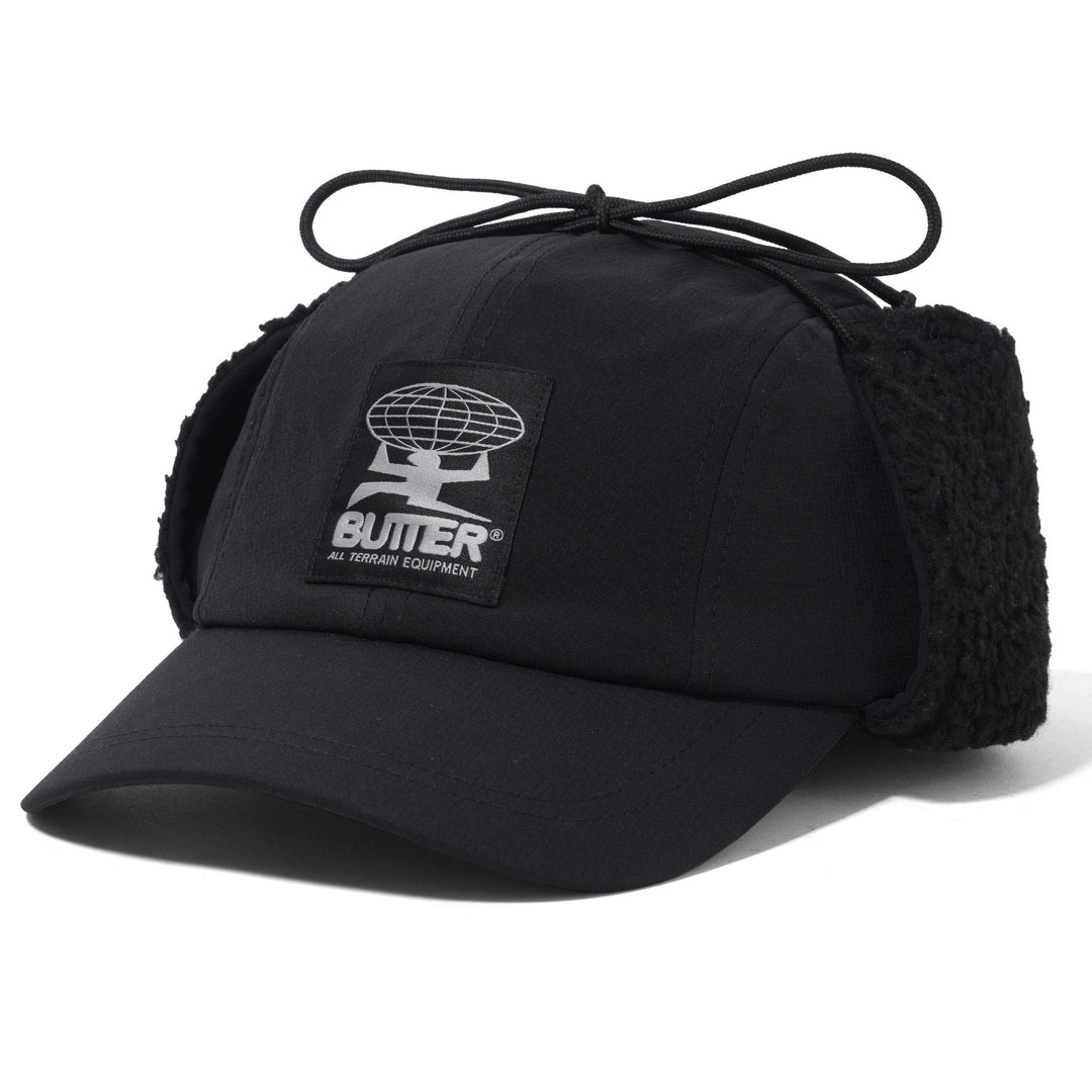 Black cap with fleece lining and visible brand logo on a white background