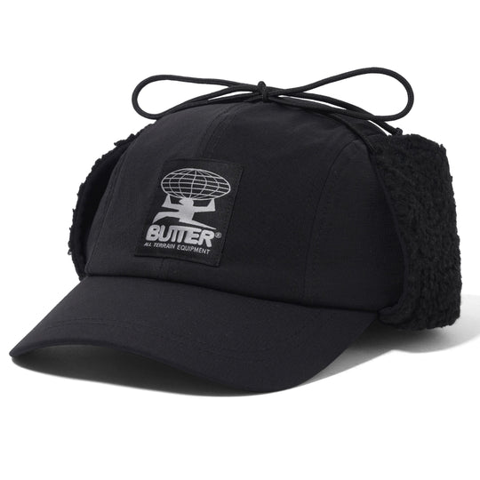 Black cap with fleece lining and visible brand logo on a white background