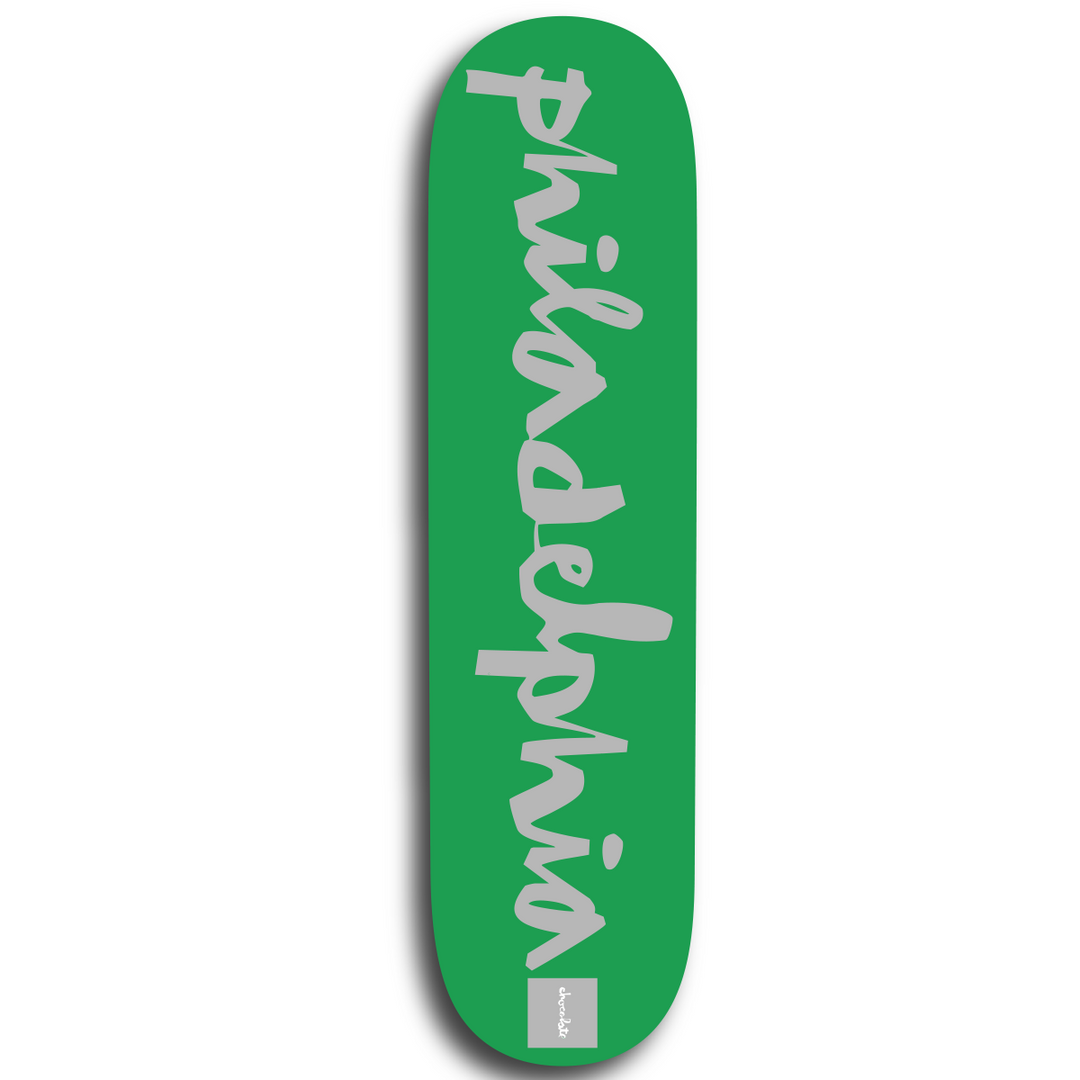 A green skateboard deck with the word &