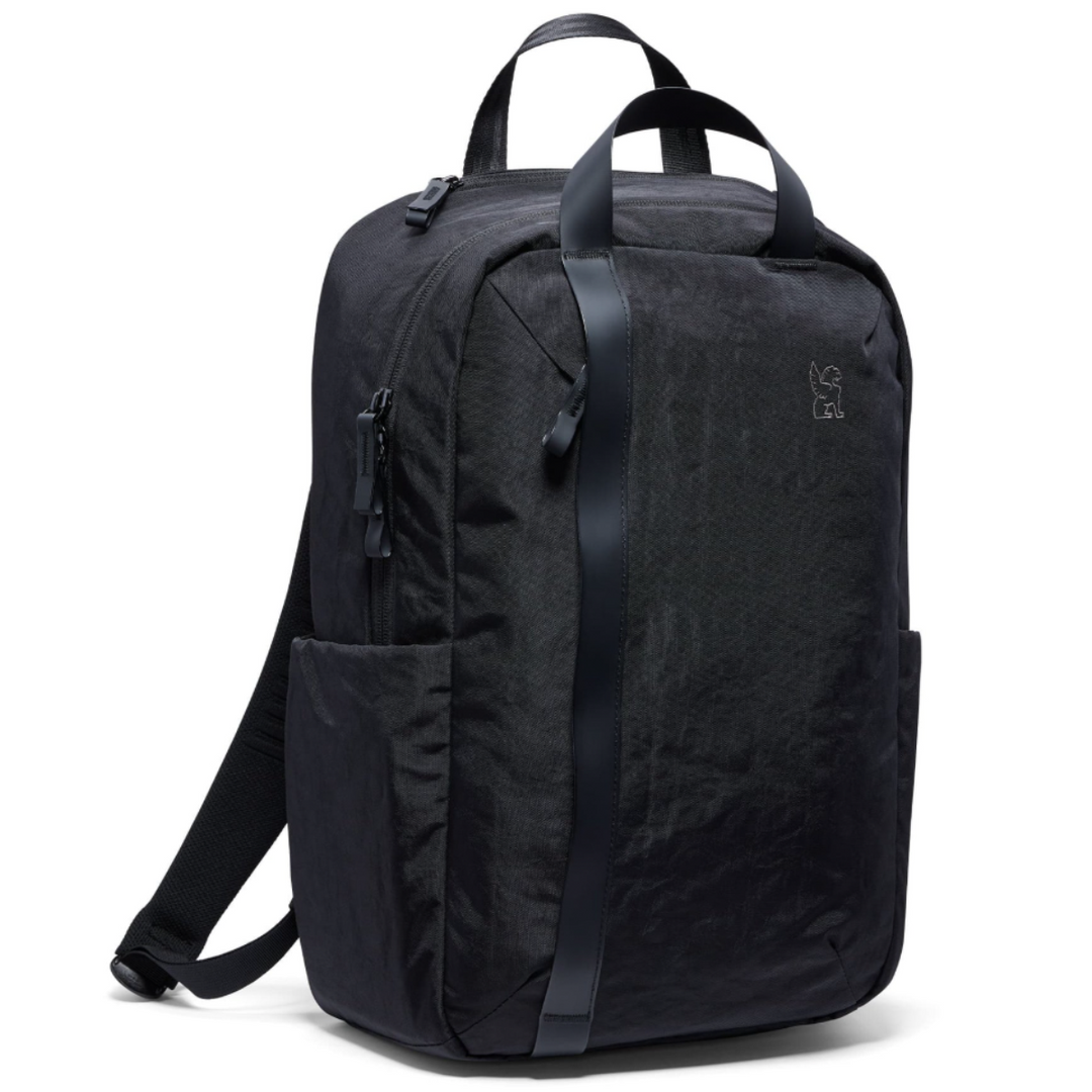 Black backpack with leather straps on a white background