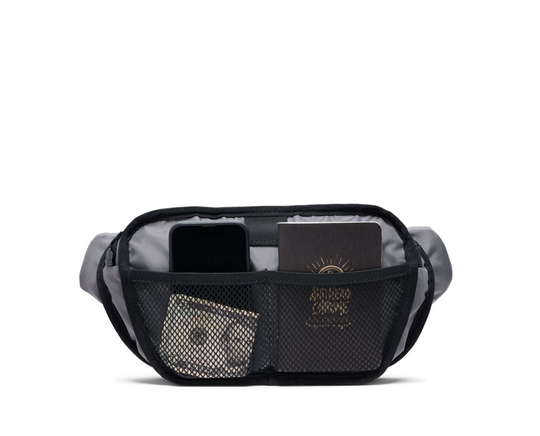 Black waist bag with compartments on a white background