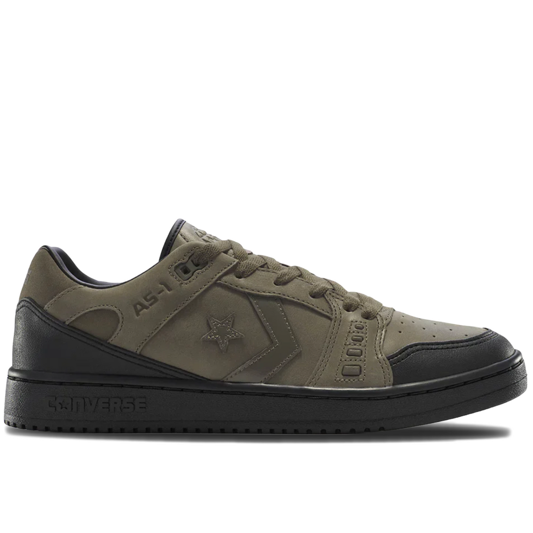 Black athletic shoe with gray accents on a white background