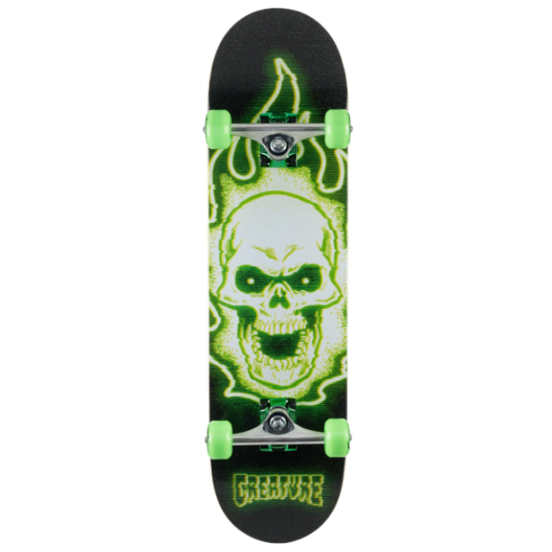 Skateboard with a green and white skull design on a black background